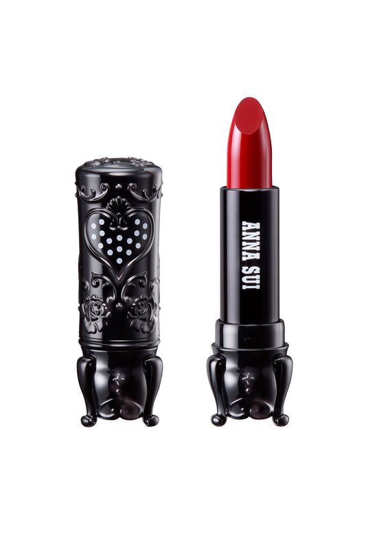 403 Bright Red in a cylindrical case, with 3 legs, a heart with white dots and floral design on the cap